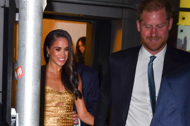 <p>Meghan Markle, Duchess of Sussex, and Prince Harry, Duke of Sussex leave The Ziegfeld Theatre in New York </p>