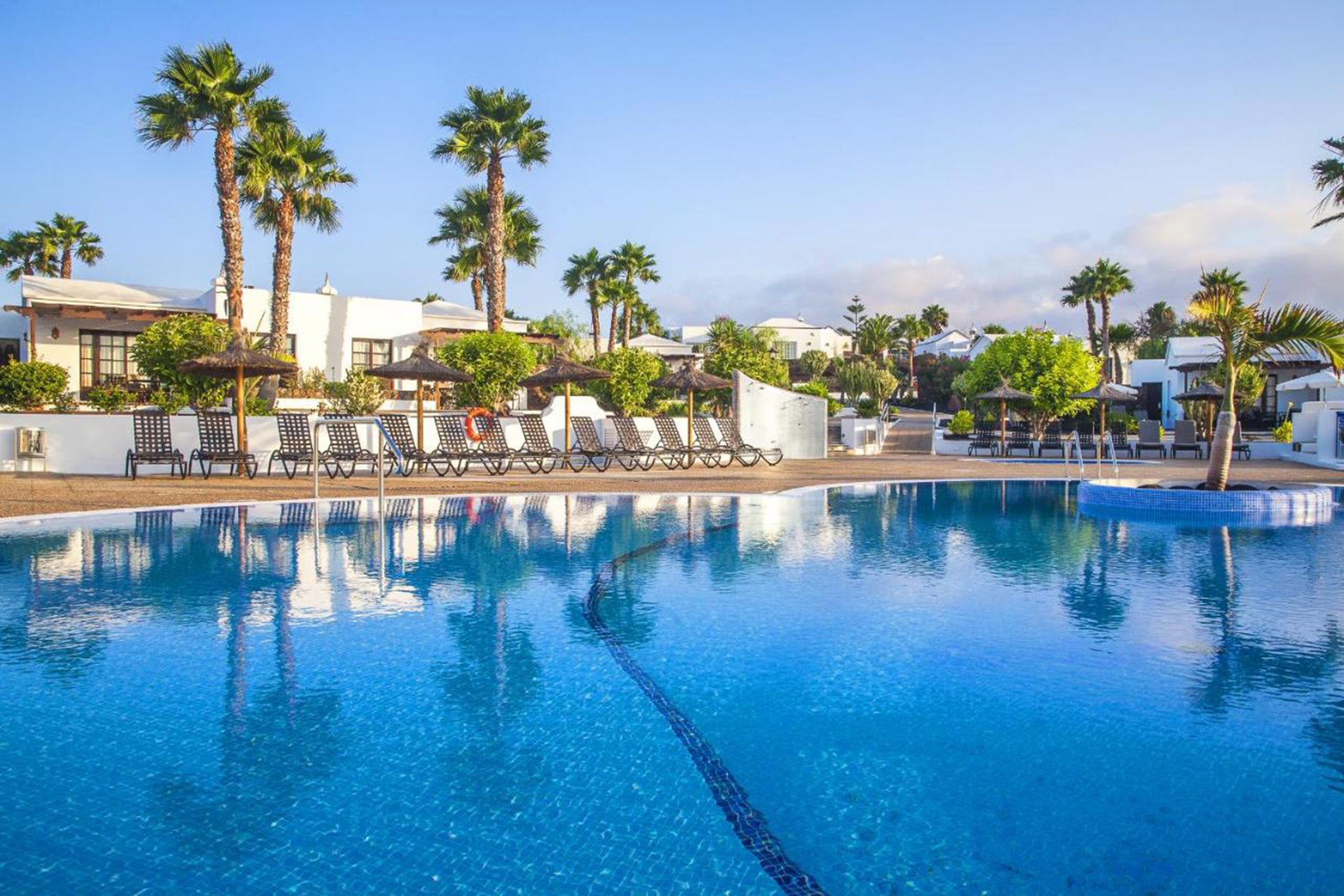 If you can tear yourself away from the pool, Playa Blanca is a short walk away