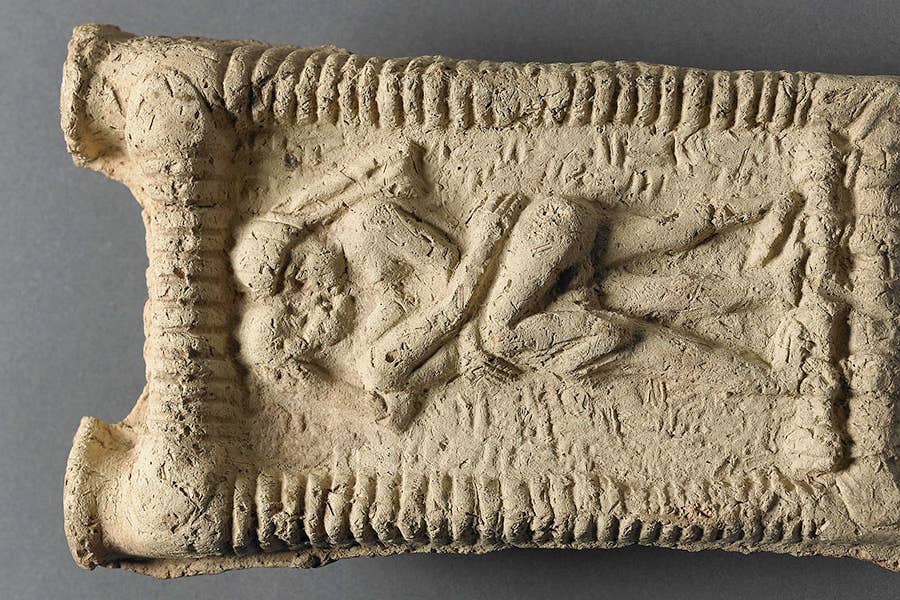 Babylonian clay model showing an erotic scene from 1800 BC (The Trustees of the British Museum/PA)