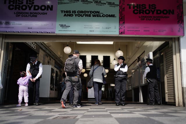 Police officers at West Croydon train station (Jordan Pettitt/PA)