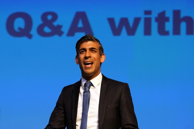Rishi Sunak said the integration of AI ‘has to be done safely and securely’ (Andrew Milligan/PA)