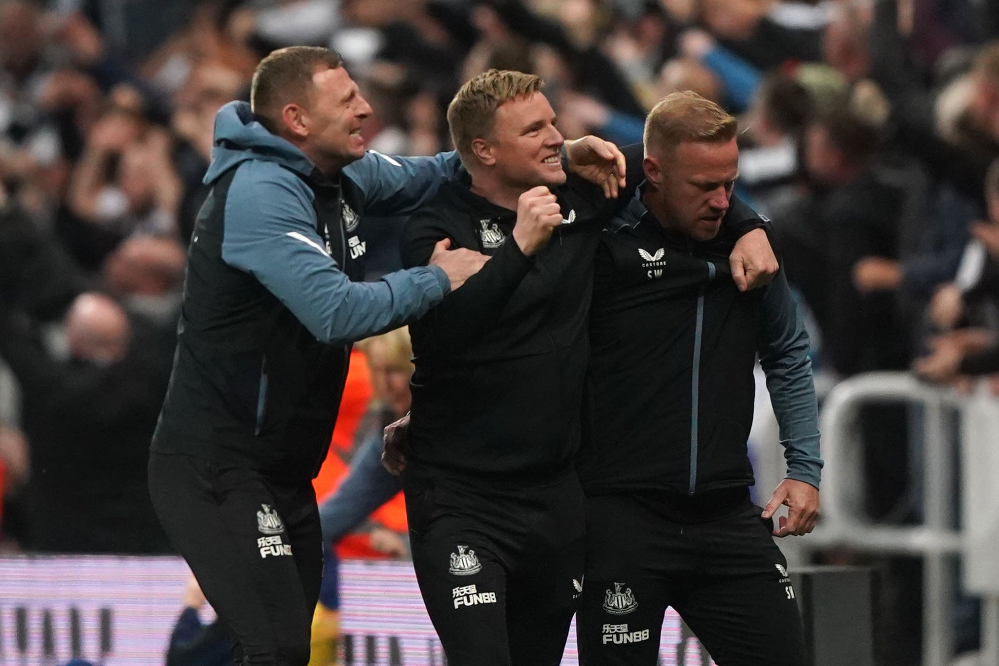 Newcastle head coach Eddie Howe (centre) insists he is not allowing himself to get excited about the Champions League (Owen Humphreys/PA)