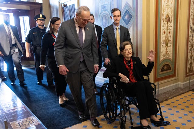 <p>Dianne Feinstein greets reporters upon her return to the Senate </p>