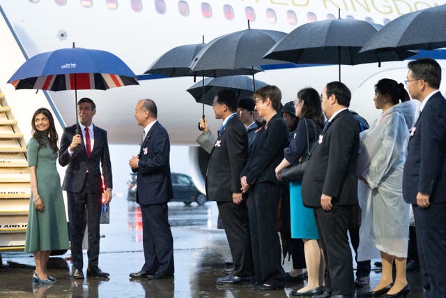 Prime Minister Rishi Sunak and his wife Akshata Murty arriving by plane in Hiroshima after their visit to Tokyo (Stefan Rousseau/PA)