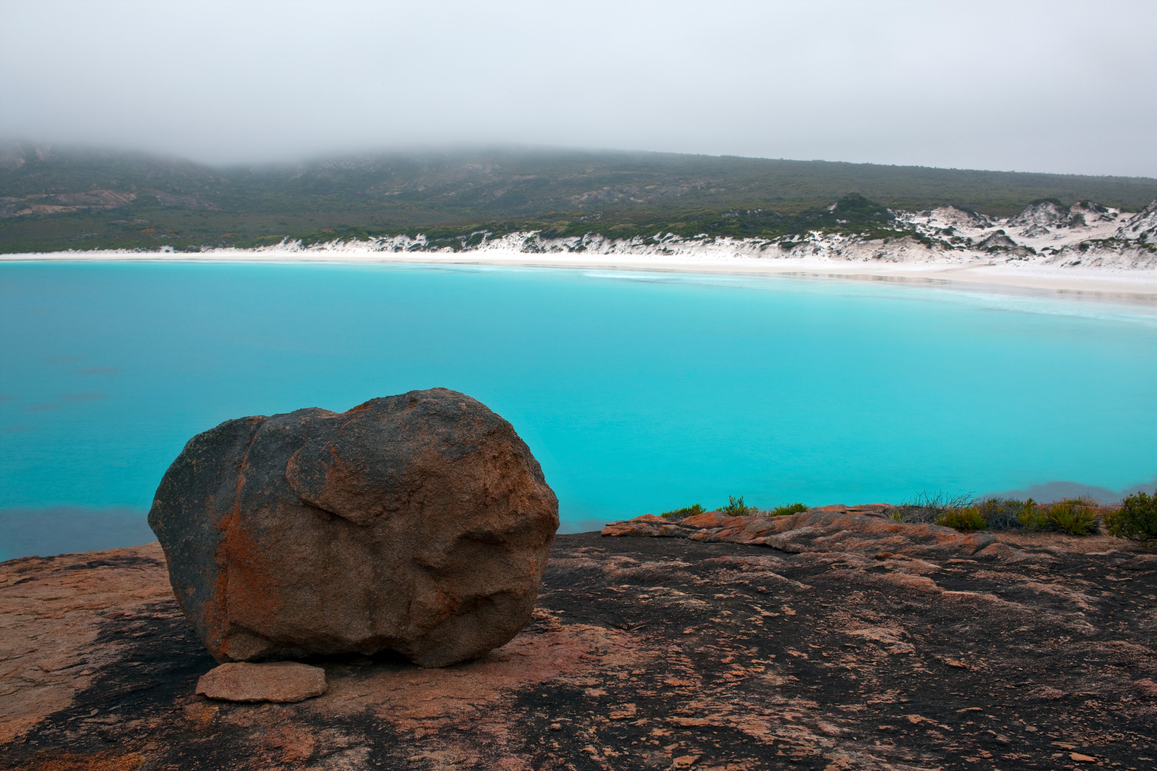 Nestled between granite rock shelves, Little Hellfire Bay is a dream for secluded swims and BBQs