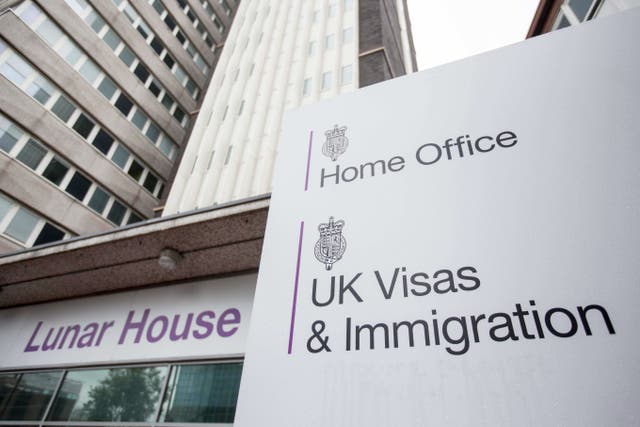Total net migration in the 12 months to June 2022 stood at an estimated 504,000 (Rick Findler/PA)
