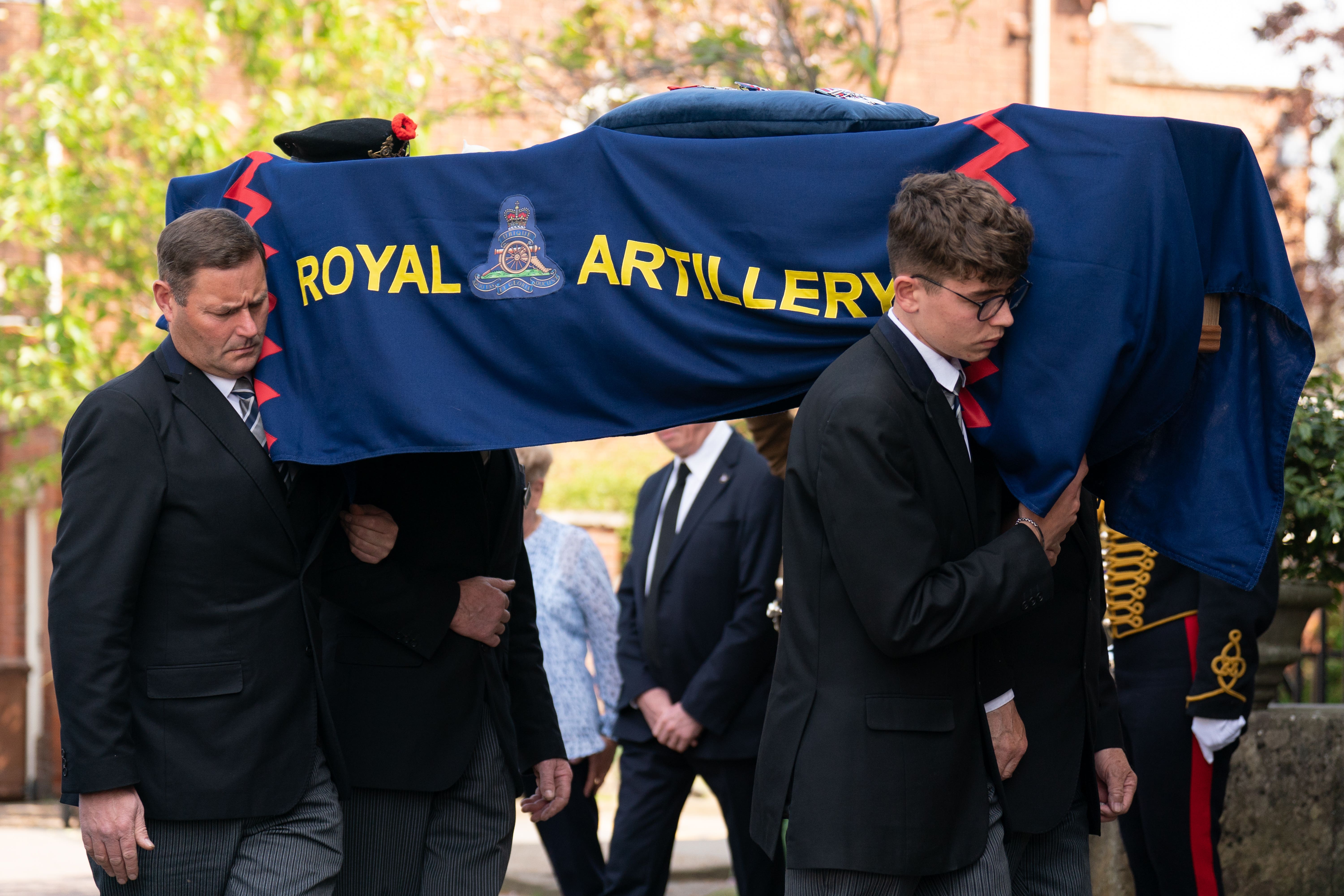 The coffin of D-Day veteran Joe Cattini is carried into a church (Joe Giddens/PA)