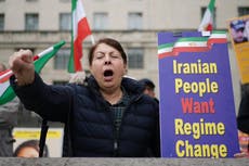 Demonstrators gather outside Downing Street to protest against Iran executions
