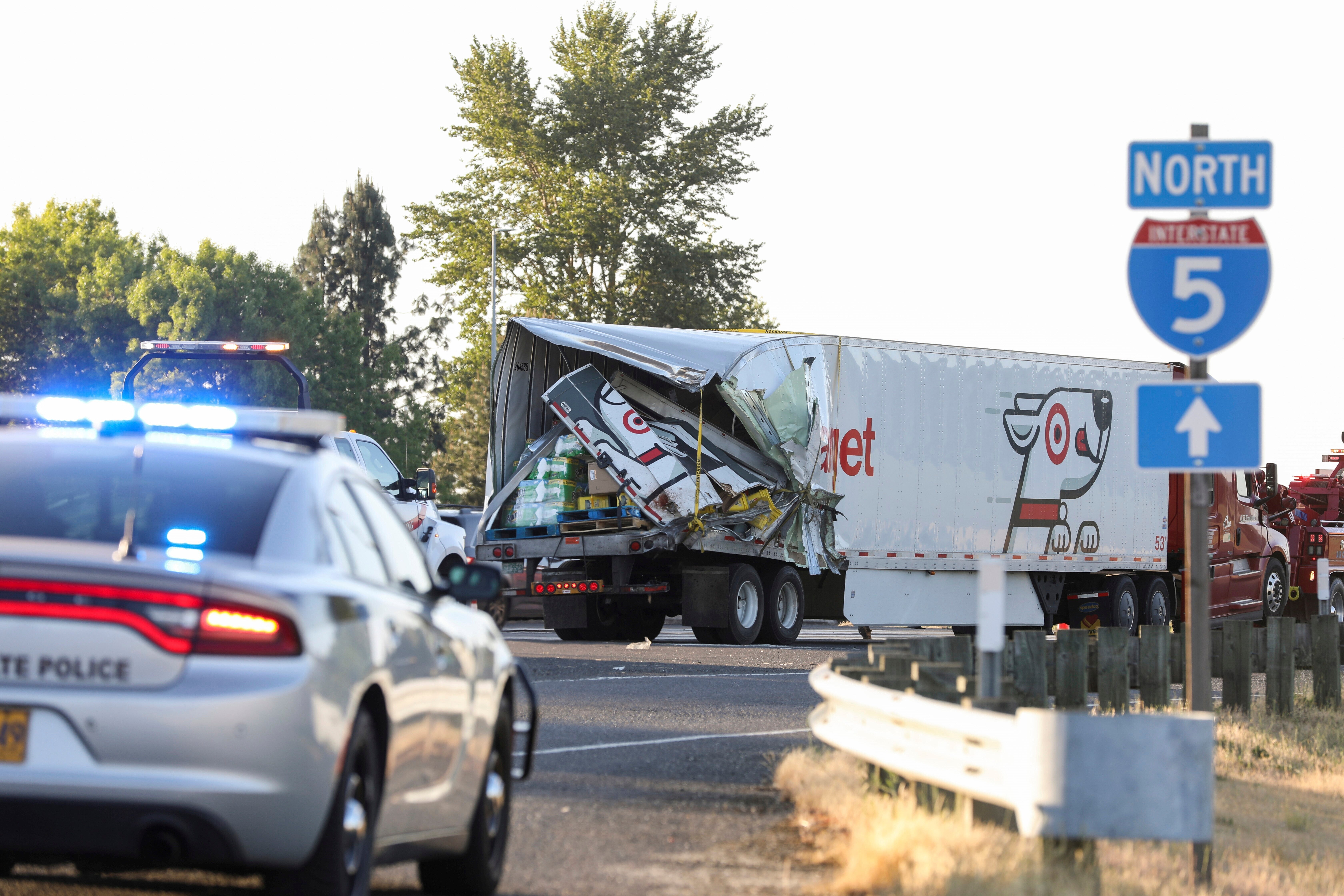 The back end of a semi-truck sits along Interstate 5, on Thursday, May 18, 2023, in Marion County, Ore.