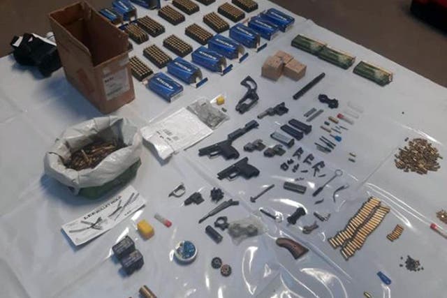 Guns, ammunition and firearms were seized (National Crime Agency/PA)