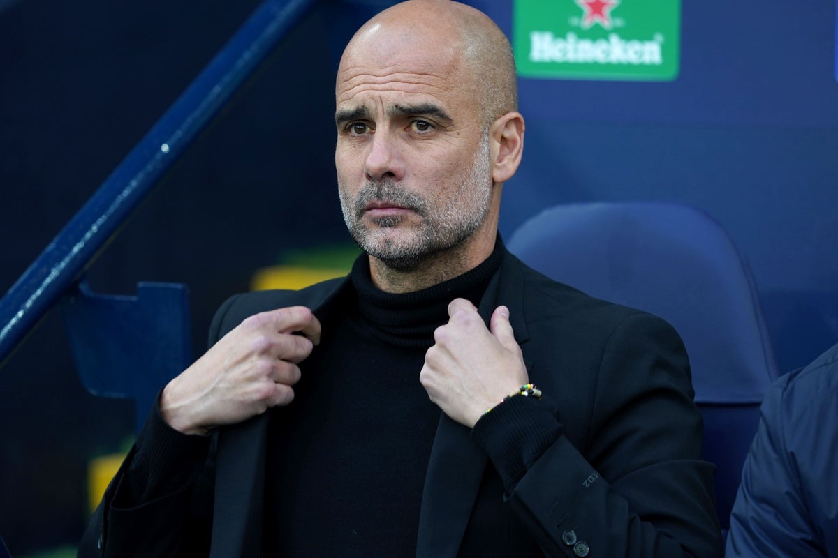 Man City boss Pep Guardiola plays down his role in treble-chasing campaign