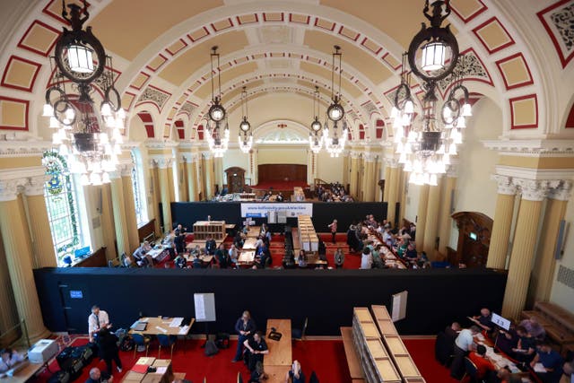 A general view as ballots are tallied in the Great Hall of Belfast City Hall as counting continues (Liam McBurney/PA)
