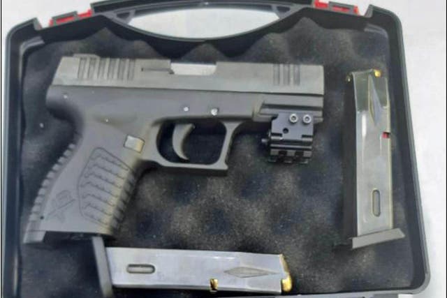 A converted weapon and ammunition were recovered from a car (National Crime Agency/PA)