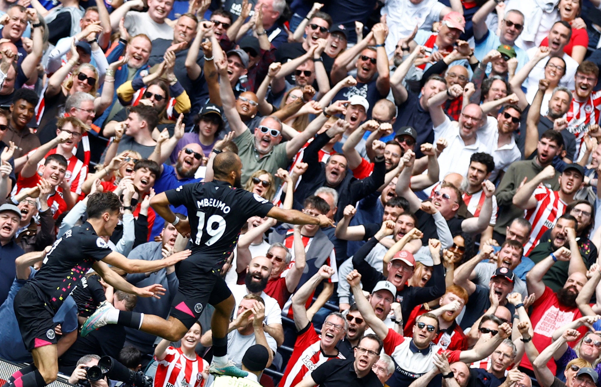 Bryan Mbeumo celebrates scoring in front of the Brentford fans