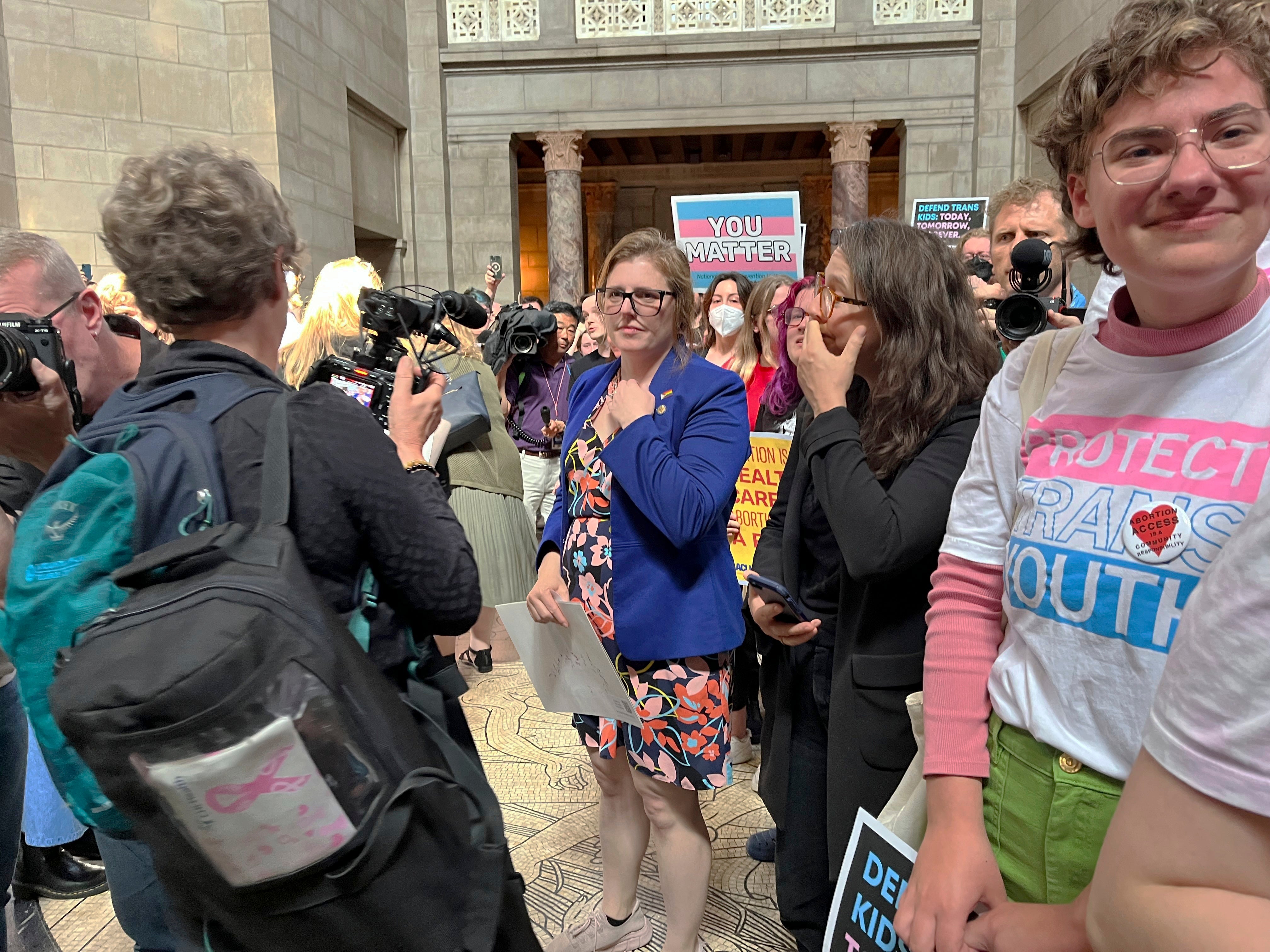 State Sen Machaela Cavanaugh addresses reporters after lawmakers passed a measure that targets both abortion and gender-affirming care