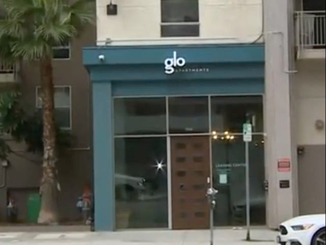 <p>The Glo apartment complex in downtown Los Angeles where four people were shot in a mailroom. All four were taken to the hospital in stable conditions</p>