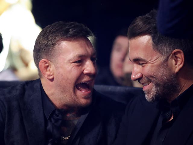 <p>Conor McGregor (left) with boxing promoter Eddie Hearn</p>