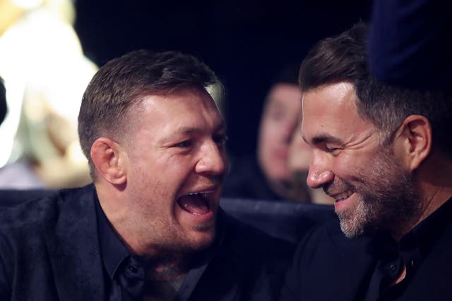 <p>Conor McGregor (left) with boxing promoter Eddie Hearn</p>