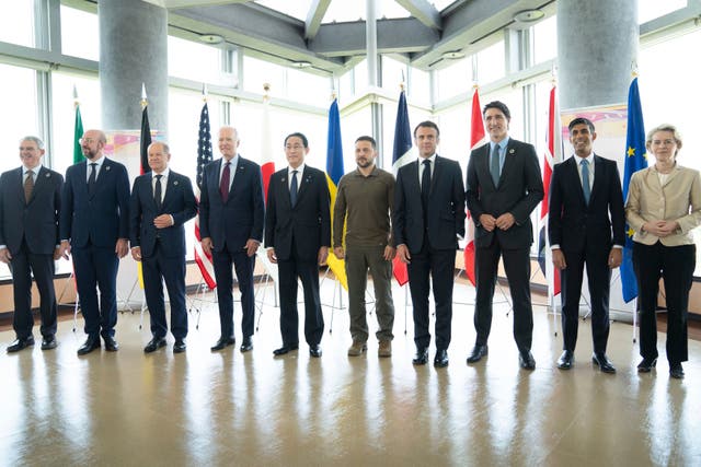 <p>Ukrainian President Volodymyr Zelensky, center, poses with G7 world leaders on the final day of the G7 Summit in Hiroshima, Japan in May.From left to right are: Gianluigi Benedetti, Italian ambassador to Japan, European Council President Charles Michel, German Chancellor Olaf Scholz, U.S. President Joe Biden, Japan's Prime Minister Fumio Kishida, Zelenskyy, France's President Emmanuel Macron, Canada's Prime Minister Justin Trudeau, Britain's Prime Minister Rishi Sunak and European Commission President Ursula von der Leyen </p>