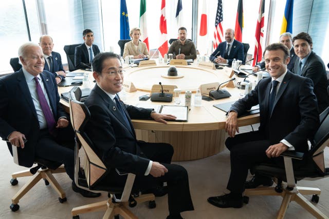 Ukrainian President Volodymyr Zelensky (centre rear) joins G7 world leaders at a working session on the final day of the G7 Summit in Hiroshima, Japan (Stefan Rousseau/PA)