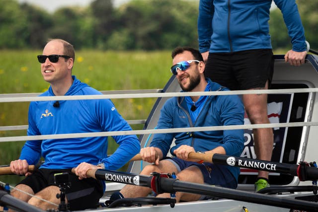<p>William takes up the oars alongside members of the HMS Oardacious crew as they took part in a training session on Dorney Lake in Buckinghamshire (Kensington Palace Copyright: The Prince and Princess of Wales/PA)</p>