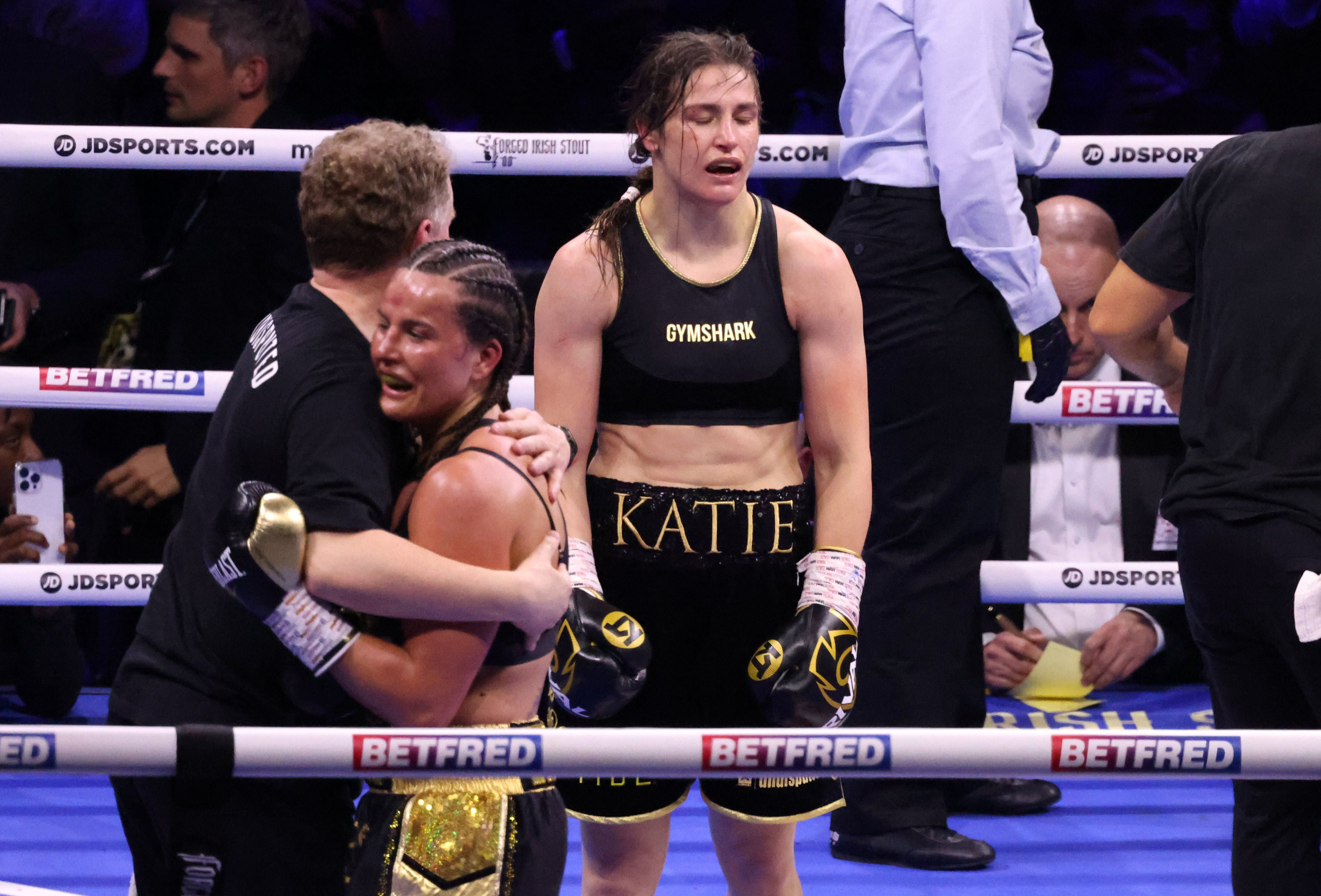 A defeated Katie Taylor stands in disbelief after her title fight against Chantelle Cameron at the 3Arena in Dublin
