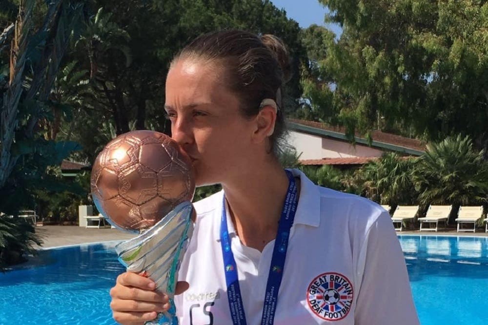 Claire Stancliffe with the World Cup 2016 bronze trophy and medal (England Deaf Women’s Football Team)