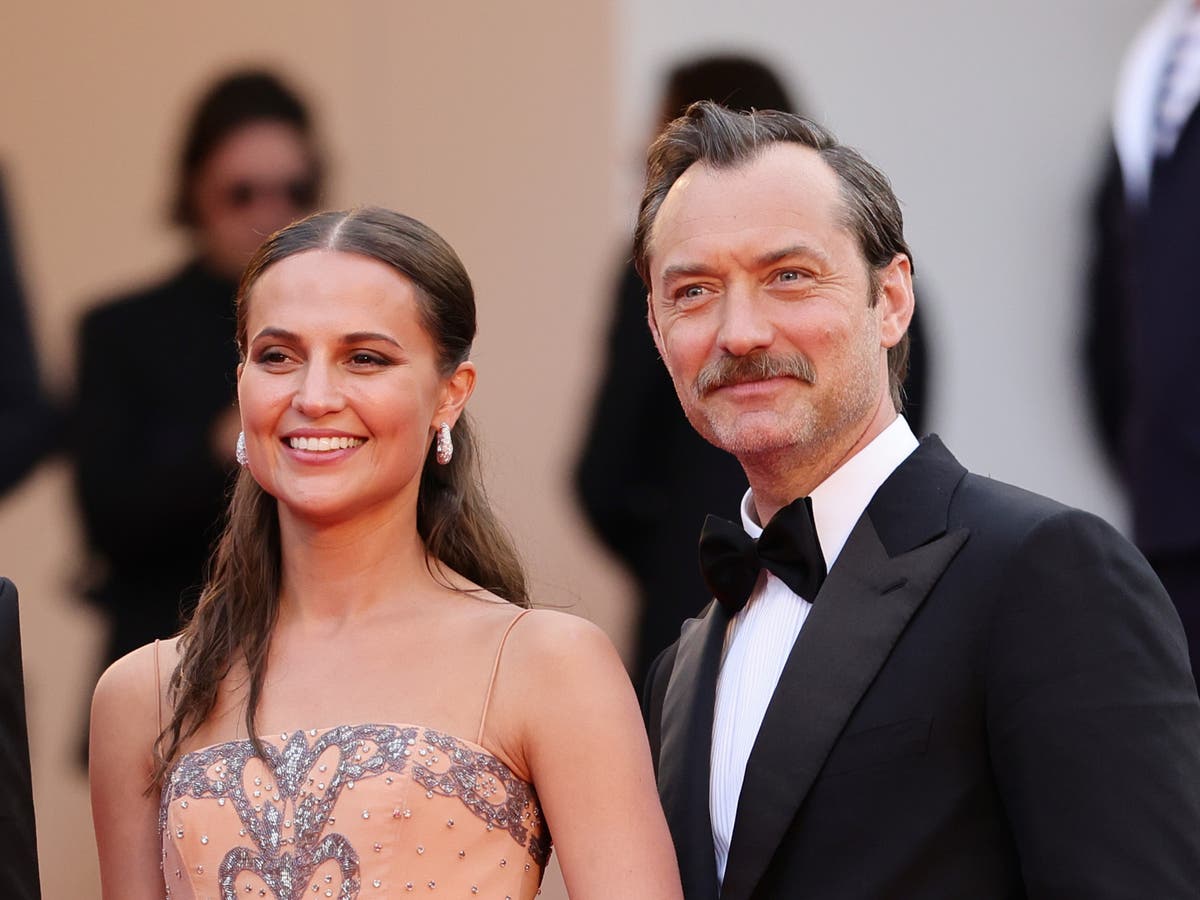 Alicia Vikander and Jude Law get eight-minute standing ovation at Cannes