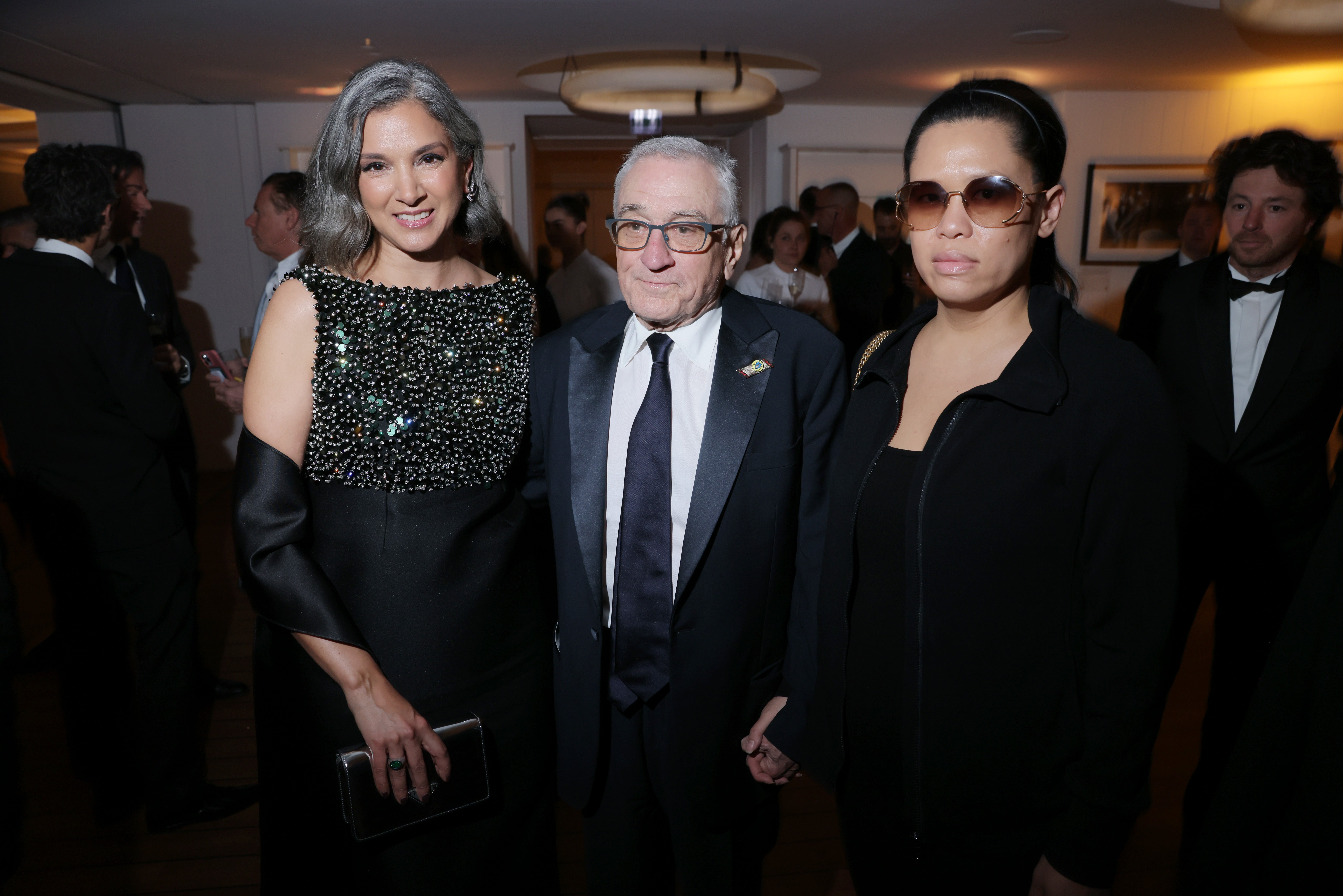 Radhika Jones, Robert De Niro and Tiffany Chen attend the Vanity Fair x Prada Party at Cannes Film Festival