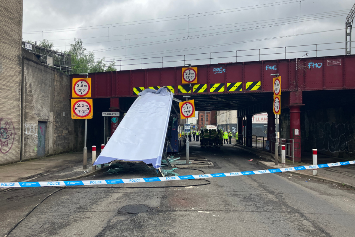 Investigation after double-decker bus hits bridge in Glasgow leaving 10 injured