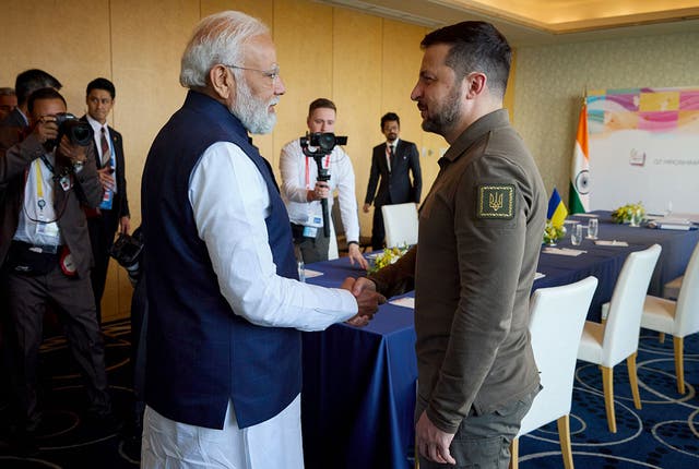 <p>Ukraine's president Volodymyr Zelensky (right) shakes hands with India's prime minister Narendra Modi (left) in Hiroshima on the second day of the G7 summit</p>