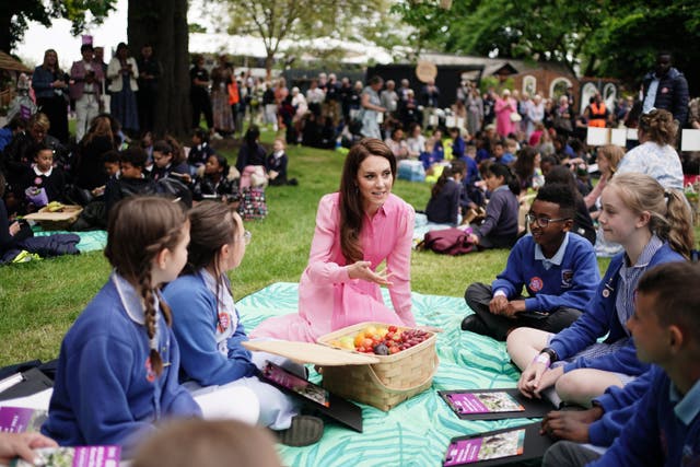 <p>The Princess of Wales with pupils at the first children’s picnic at the RHS Chelsea Flower Show (Jordan Pettitt/PA)</p>