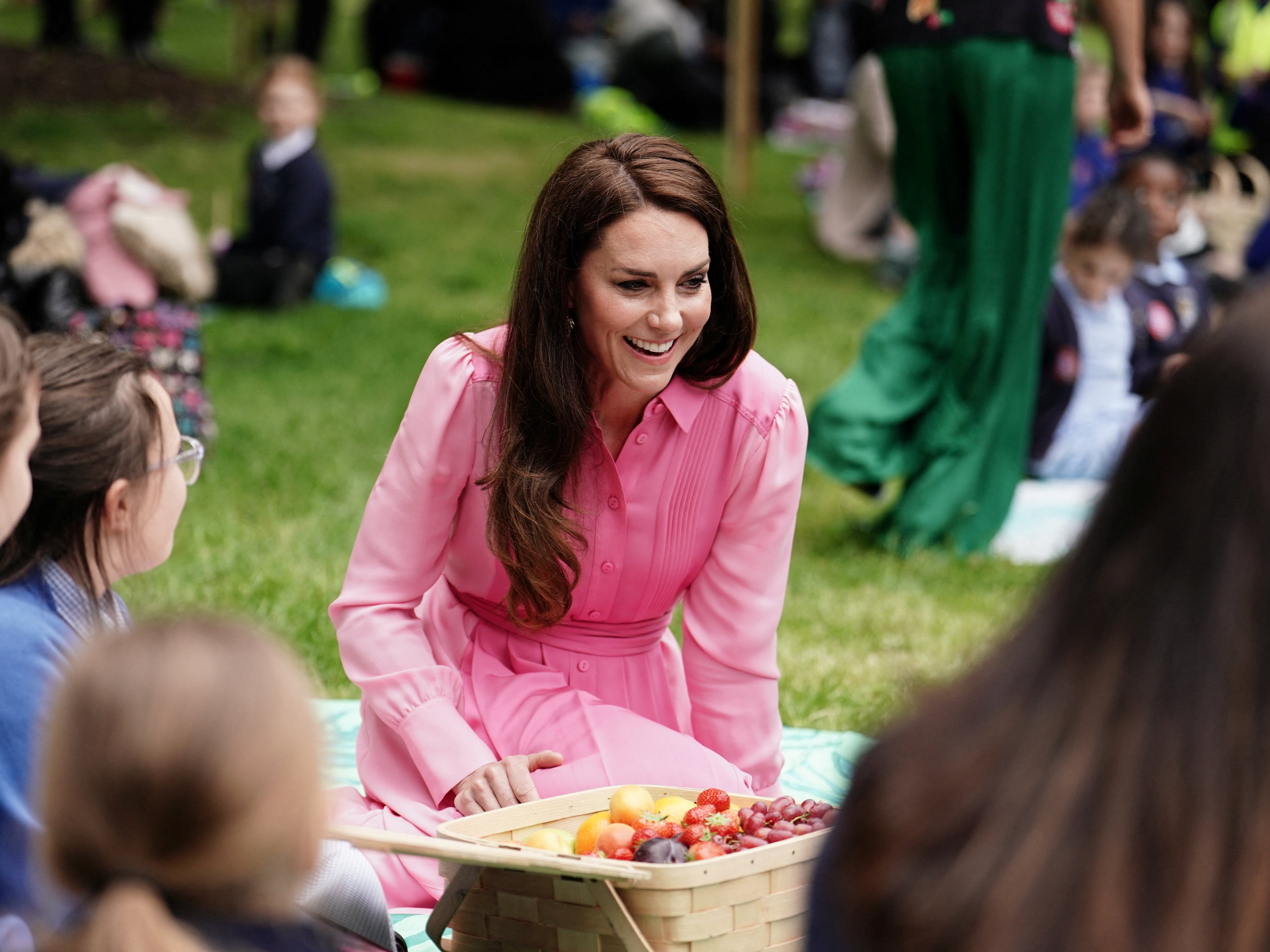 The Princess of Wales with pupils from schools taking part in the first Children's Picnic at the RHS Chelsea Flower Show, at the Royal Hospital Chelsea, London