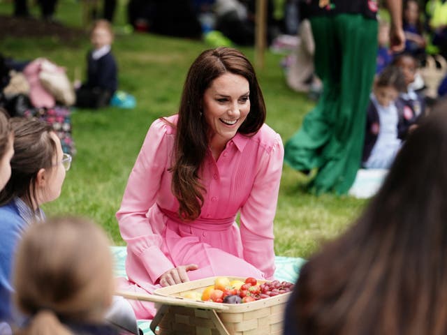 <p>The Princess of Wales with pupils from schools taking part in the first Children's Picnic at the RHS Chelsea Flower Show, at the Royal Hospital Chelsea, London</p>