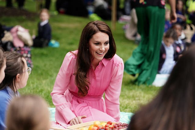 <p>The Princess of Wales with pupils from schools taking part in the first Children's Picnic at the RHS Chelsea Flower Show, at the Royal Hospital Chelsea, London</p>