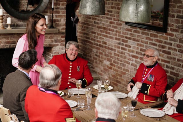 The Princess of Wales speaks to the Chelsea Pensioners, after taking part in the first Children’s Picnic at the RHS Chelsea Flower Show (Jordan Pettitt/PA)