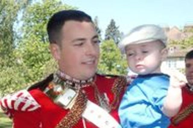 Lee Rigby with son Jack aged seven months (Scotty’s Little Soldiers/PA)