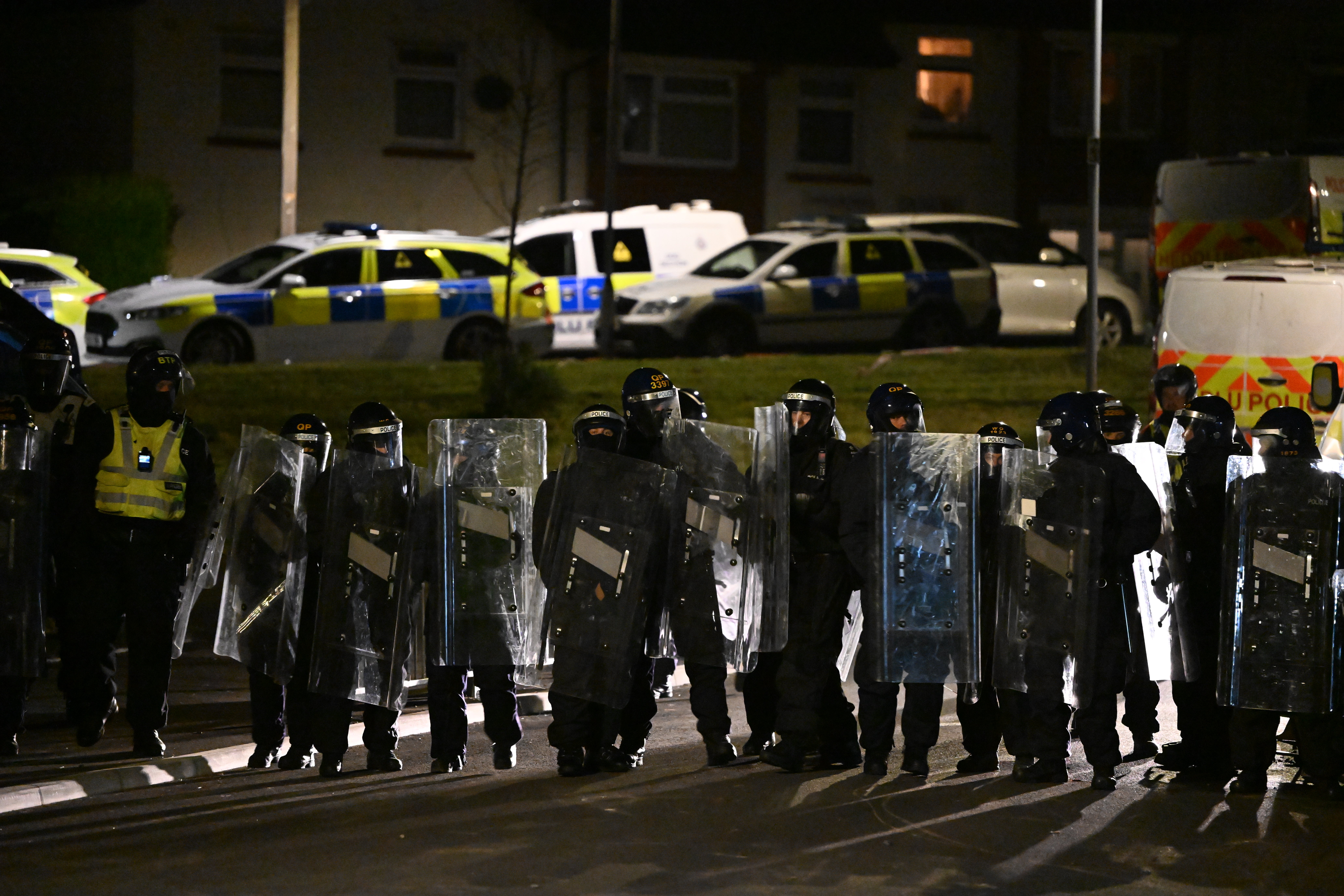 Riot police at the scene on Monday night