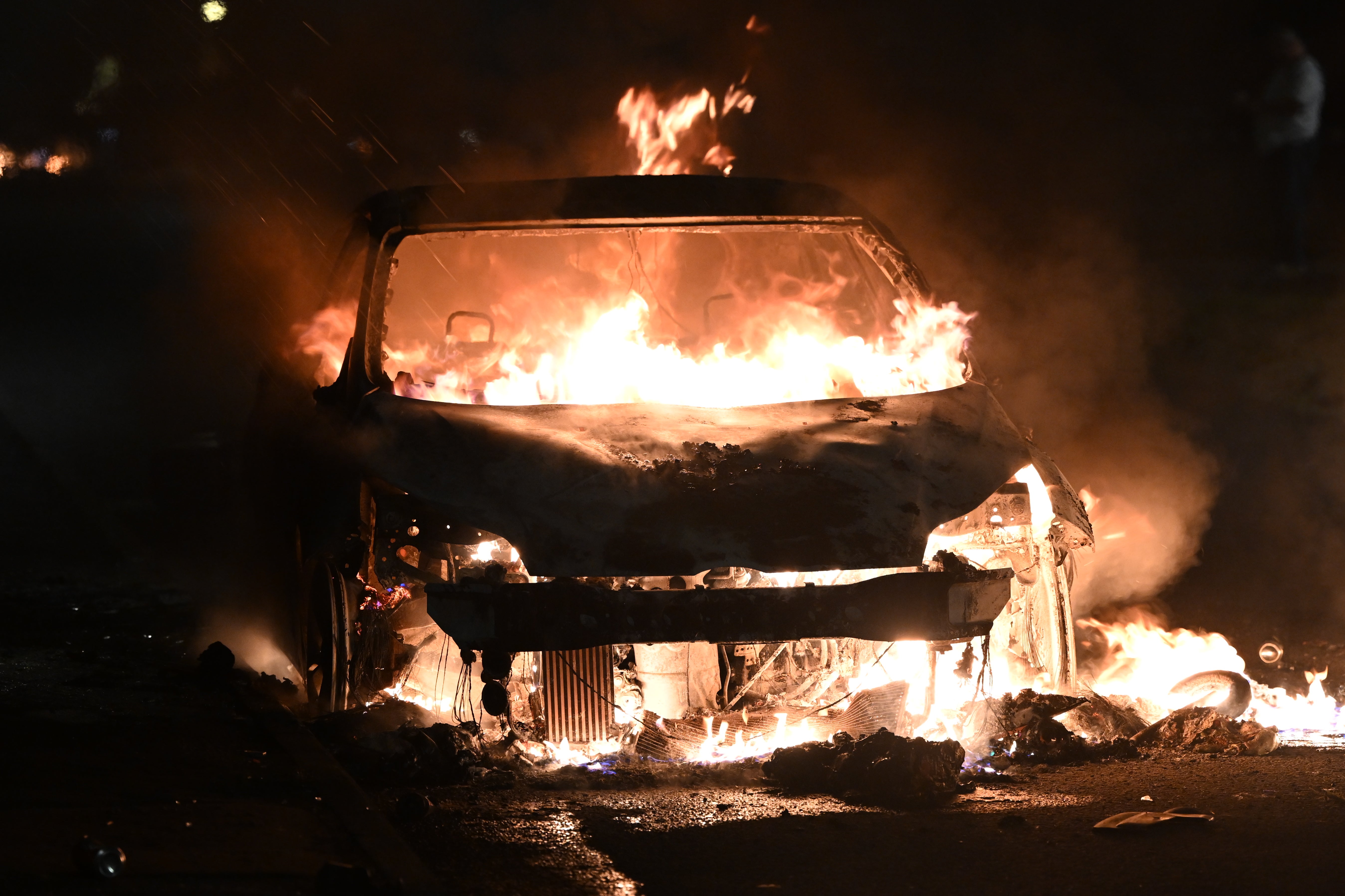 Multiple vehicles were set alight during the violence