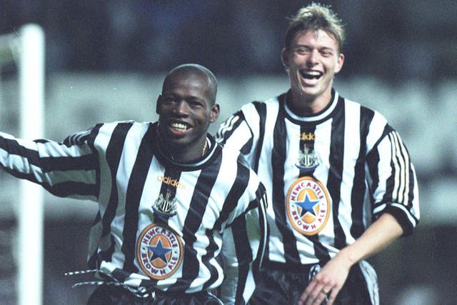 Jon Dahl Tomasson (right) rushed to congratulate hat-trick hero Faustino Asprilla during the 3-2 Champions League victory over Barcelona (Owen Humphreys/PA)