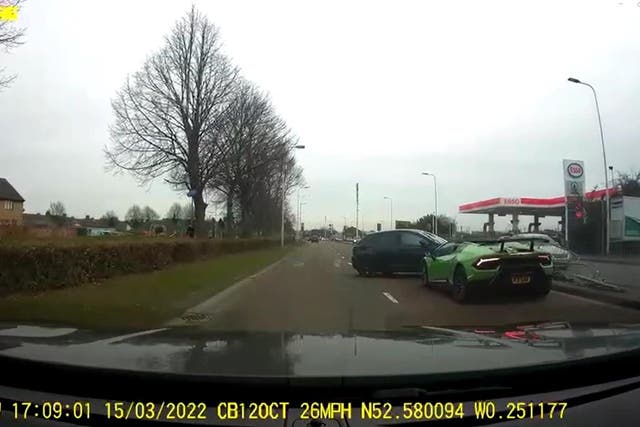 A screengrab from dashcam footage of the scene after Lamborghini driver Gull Khan crashed into a Seat Leon on the A15 Bourges Boulevard in Peterborough (Cambridgeshire Police/PA)