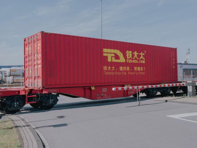 <p>A container from China arrives at the port of Duisburg on 4 May </p>