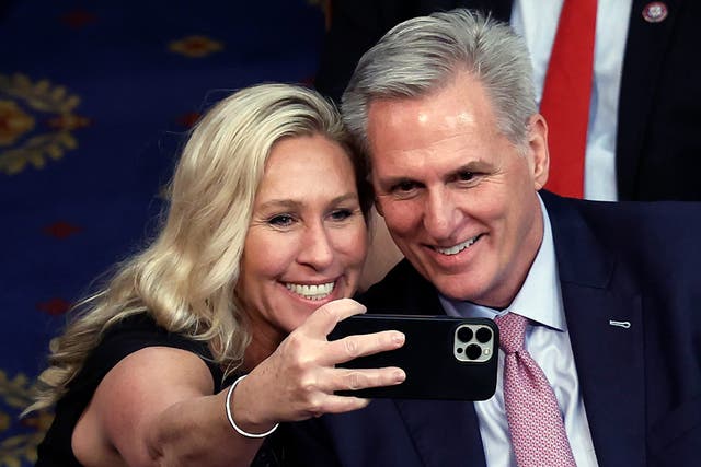 <p>Marjorie Taylor Greene (R-GA) takes a photo with U.S. House Republican Leader Kevin McCarthy (R-CA) after being elected Speaker of the House</p>