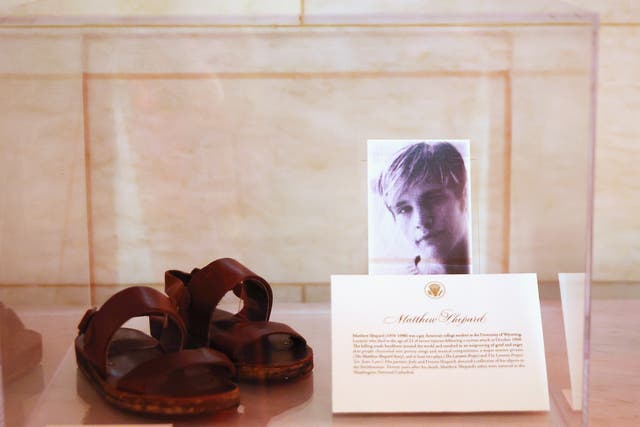<p>A pair of Matthew Shepard’s sandals are displayed at the White House as part of the commemoration of LGBTQ+ Pride Month on June 25, 2021 in Washington</p>
