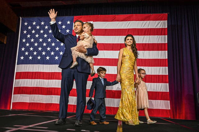 <p>Republican Governor Ron DeSantis with his wife Casey DeSantis and children Madison, Mason and Mamie, waves to the crowd during an election night watch party at the Convention Center in Tampa, Florida, on November 8, 2022</p>