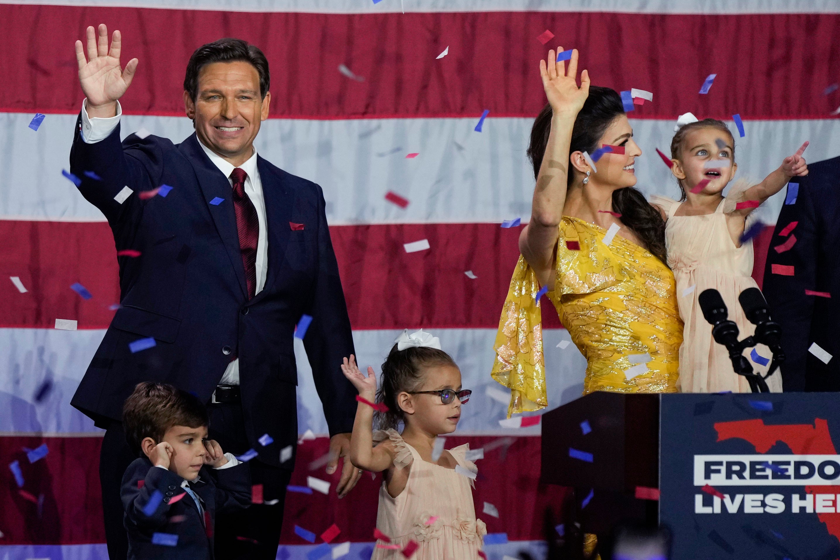 DeSantis, his wife Casey and their children on stage after speaking to supporters at an election night party after winning his race for re-election in Tampa, Florida last year