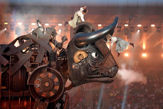 The Women appears on top of The Raging Bull during the opening ceremony of the Birmingham 2022 Commonwealth Games at the Alexander Stadium (PA)