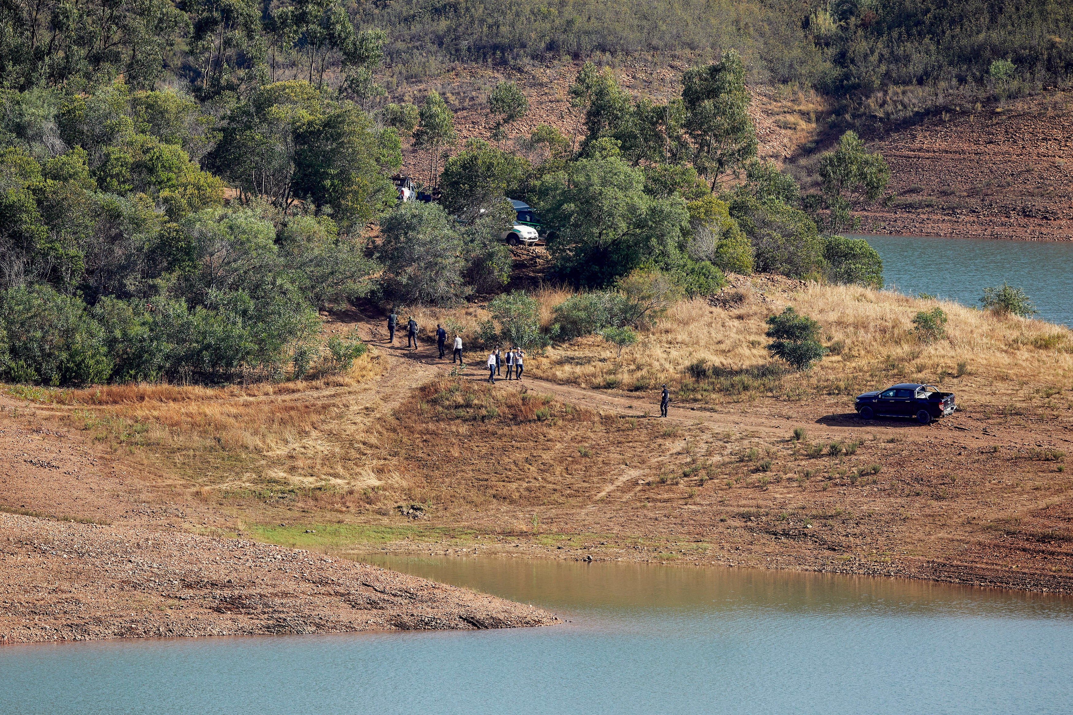 Portuguese authorities searching the Arade dam area