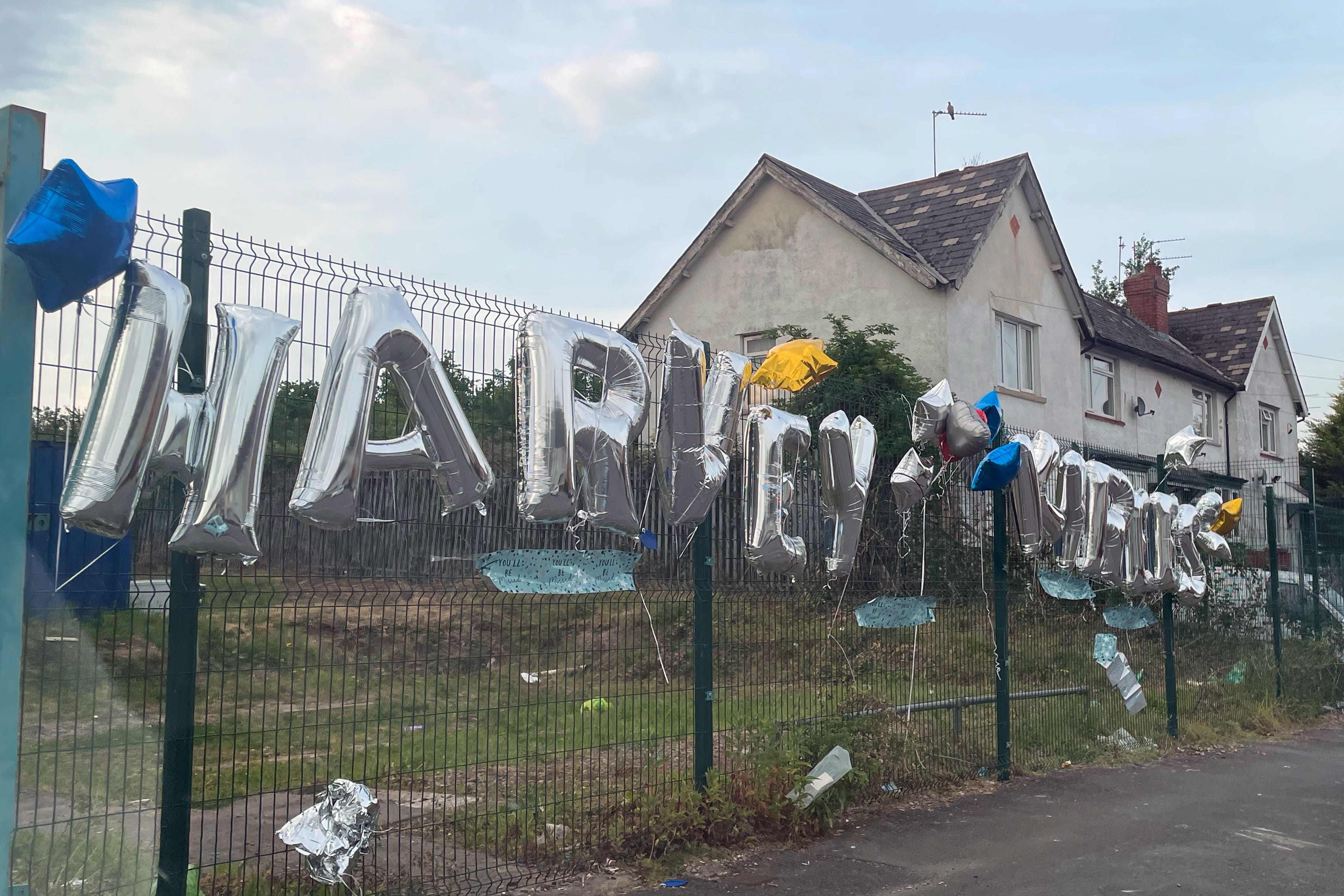 Tributes left for the two teenagers in Ely, Cardiff, whose death in a car crash sparked a riot (Bronwen Weatherby/PA)