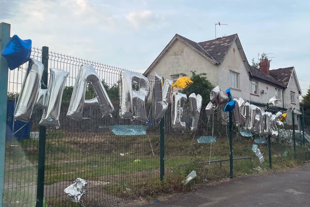 Tributes left for the two teenagers in Ely, Cardiff, whose death in a car crash sparked a riot (Bronwen Weatherby/PA)